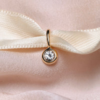 Greta diamantberlock, 18k gult guld / vitt guld