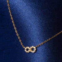 Matilda evighetssymbol med diamanter, 18k guld