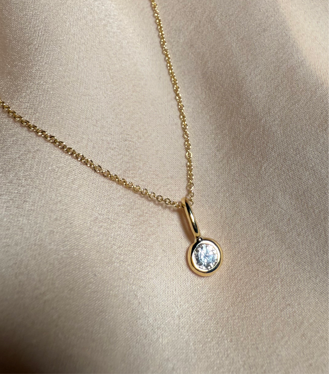 Greta diamantberlock, 18k gult guld / vitt guld