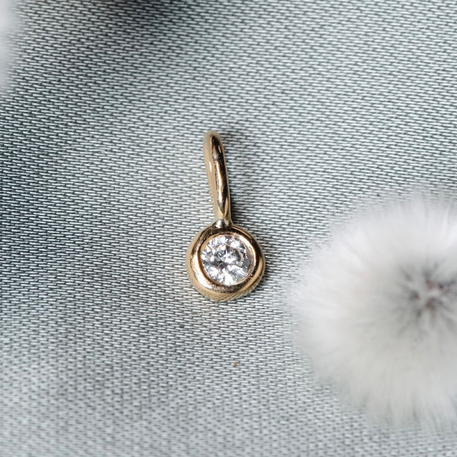 Greta diamantberlock, 18k gult guld / vitt guld