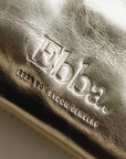 Ebba Pouch i guldfärgat läder 