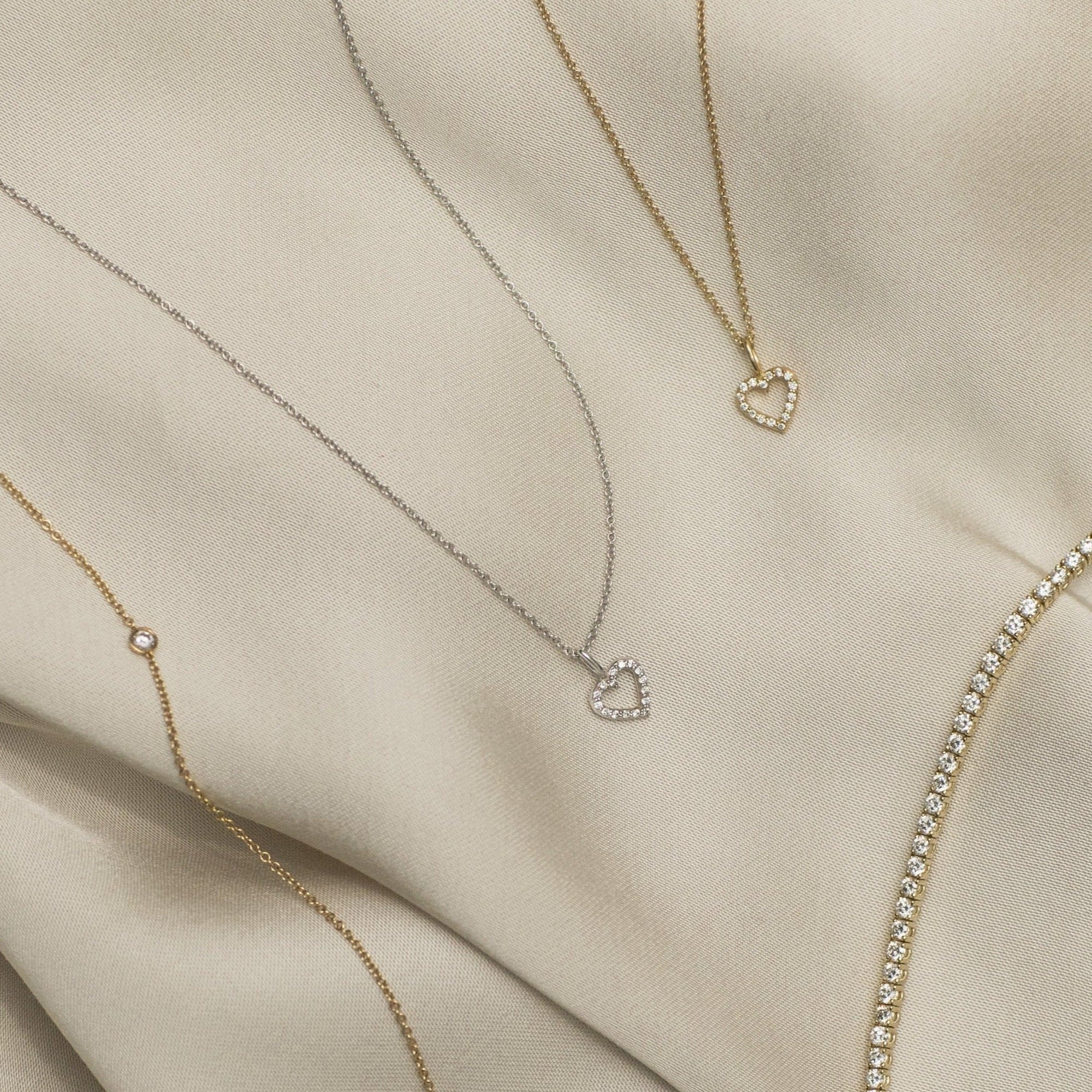 Diamanthjärta Astrid, 18k guld och  Astrid 18k vitt guld  Diamond Heart Necklace